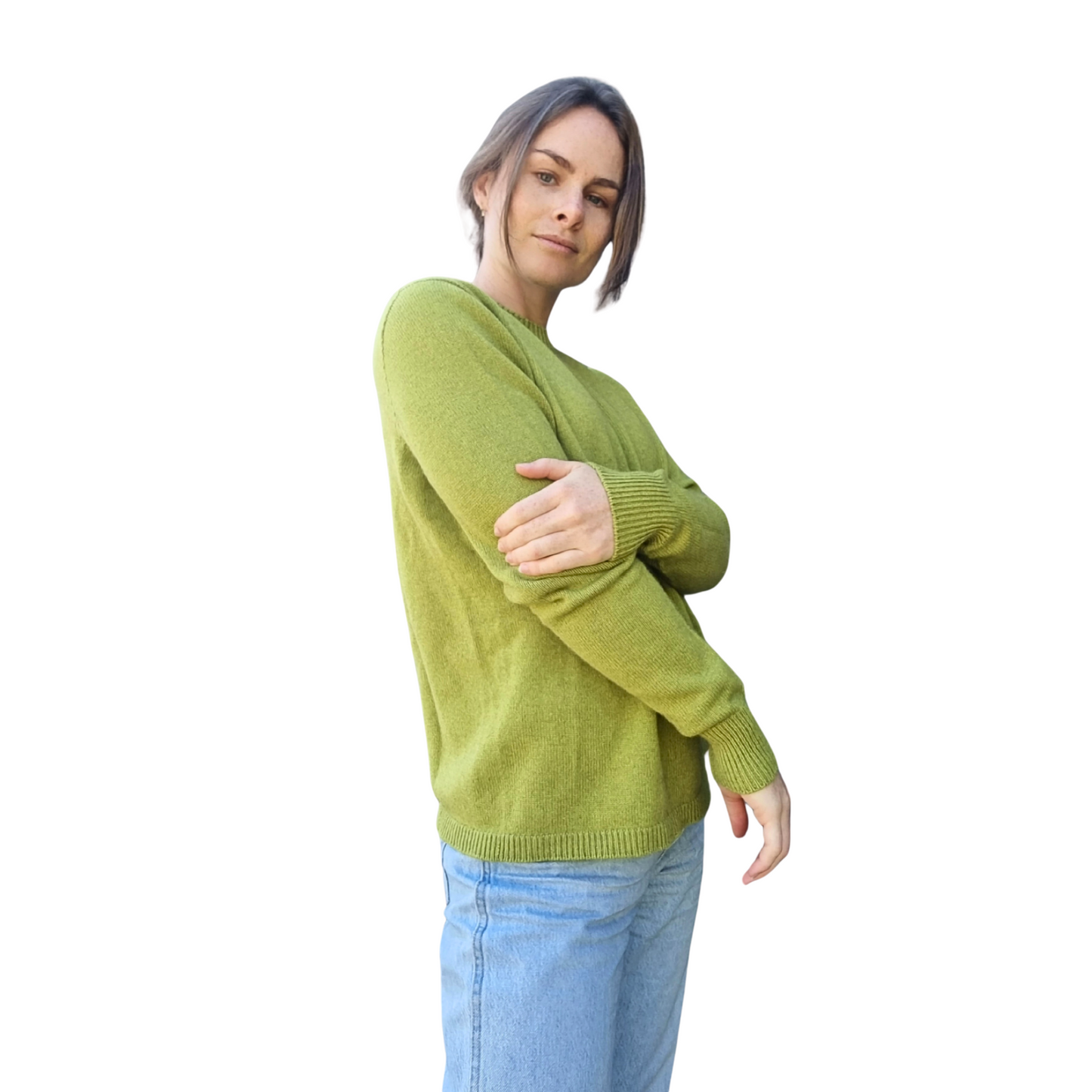 Pear green coloured Cashmere Possum silk jumper on a woman. Sweater is made in locally in New Zealand by female manufacturer