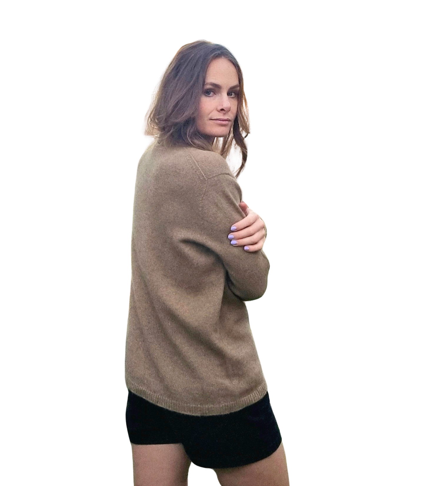 Everyday Jumper is made of caramel brown and made from Merino Possum Angora Silk. It features a crew neckline, rib hem, and cuff details. Everyday staple sweater