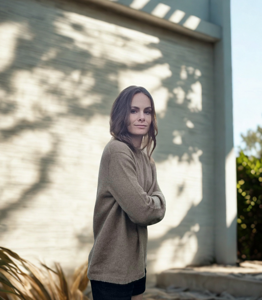 Everyday Jumper is made of caramel brown and made from Merino Possum Angora Silk. It features a crew neckline, rib hem, and cuff details. Everyday staple sweater
