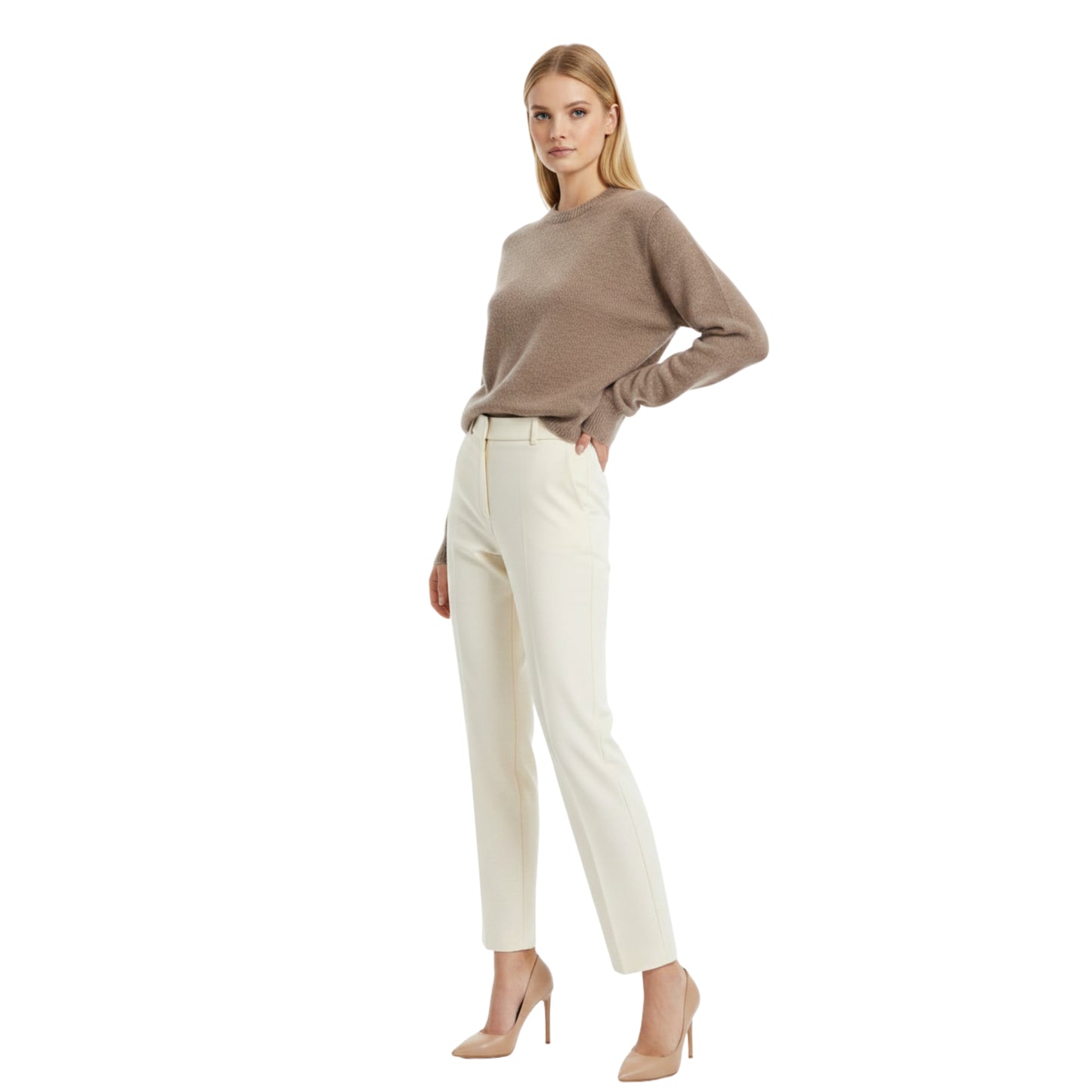 Woman wearing a brown sweater and white pants on a white background