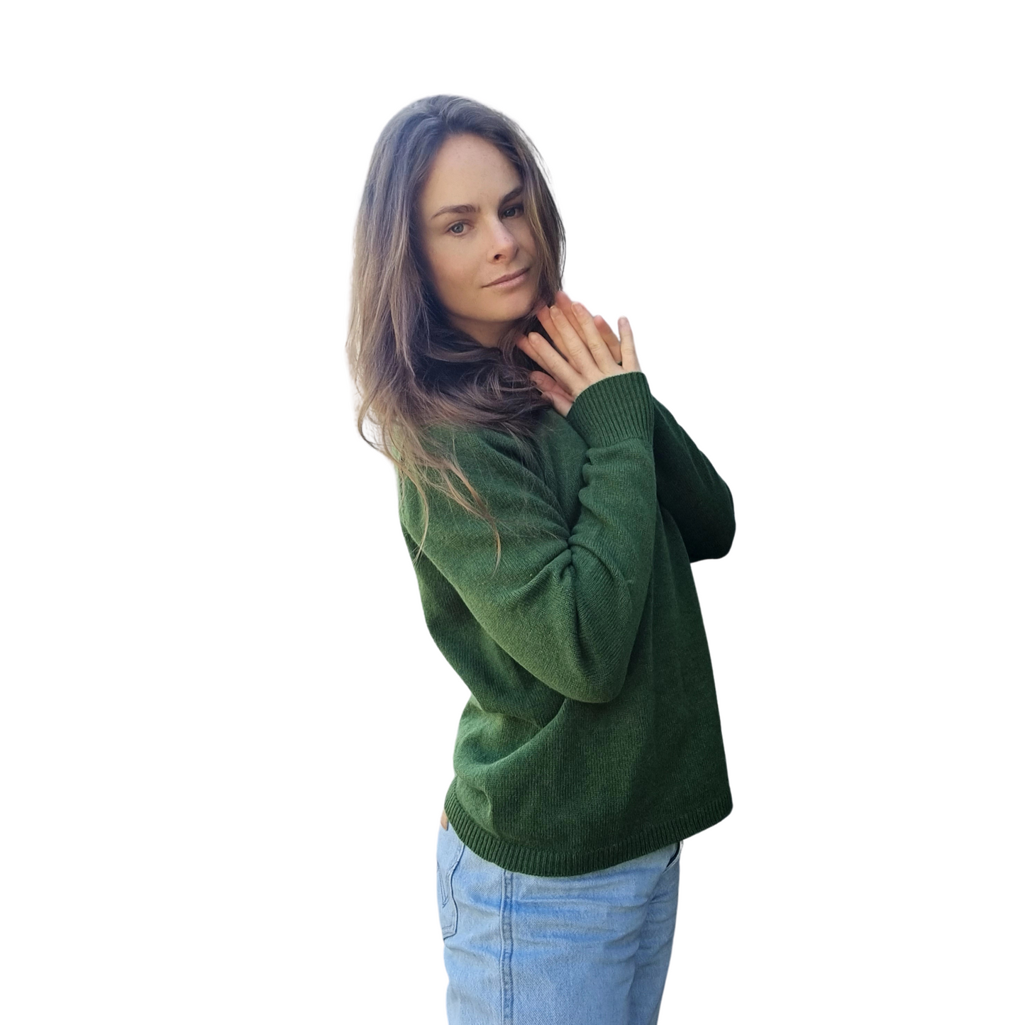 New Zealand made Merino and camel  Knitwear in a warm forest green. Everyday sweater with long sleeves, rib hem and cuff details and and a crew neck. Side view