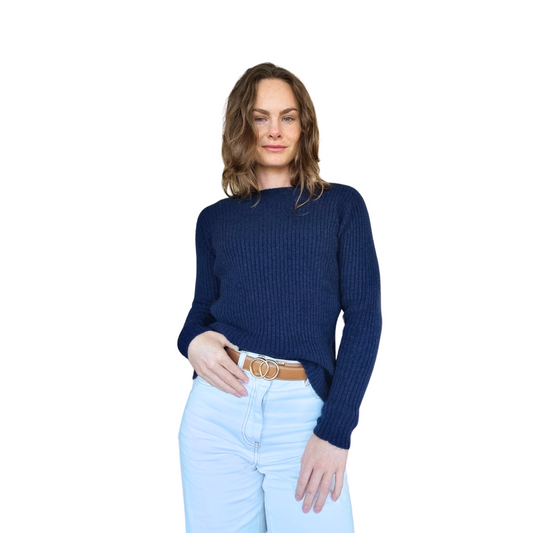 Brunette women wearing a ink blue Merino Possum Nylon Sweater that has a mock neck, long ribbed sleeves and a ribbed body. Jumper is made in New Zealand
