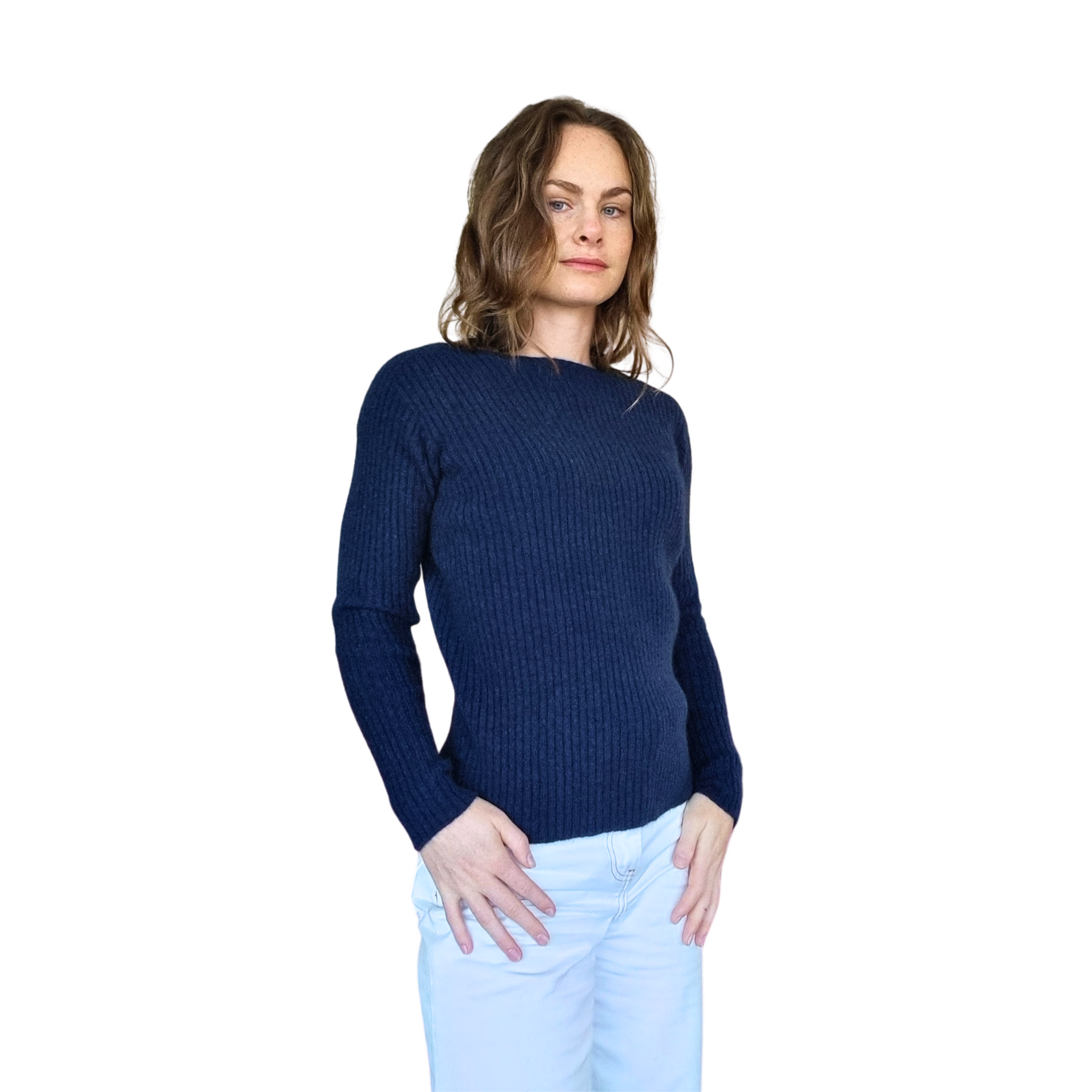 Brunette women wearing a ink blue Merino Possum Nylon Sweater that has a mock neck, long ribbed sleeves and a ribbed body. Jumper is made in New Zealand
