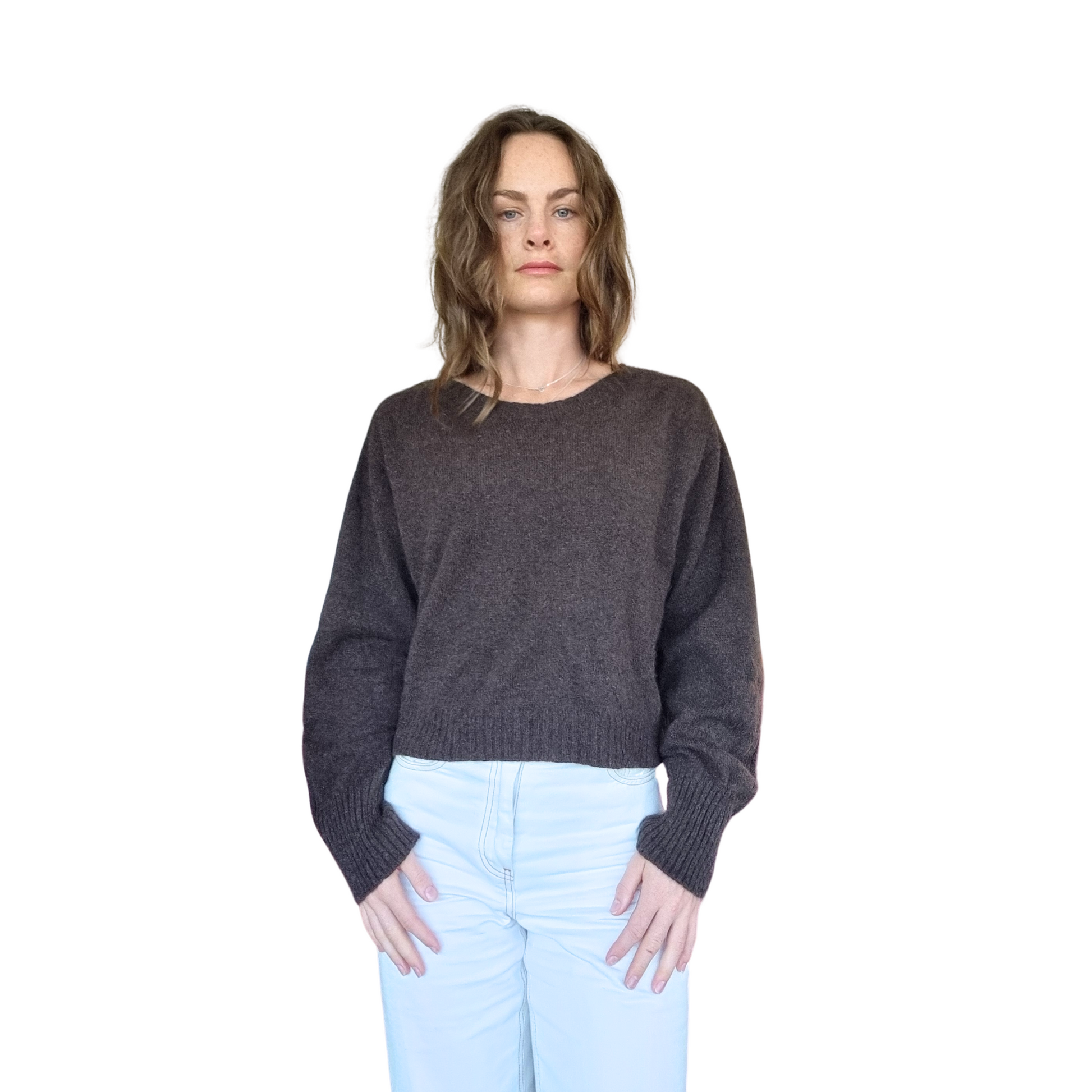 Crew neckline cropped boxy jumper woth rib detail along sleeve. Loose fit cuffs and hem sitting at waist section. Made in New Zealand from Merino Possum and Silk. Favourite Jumper currently trending