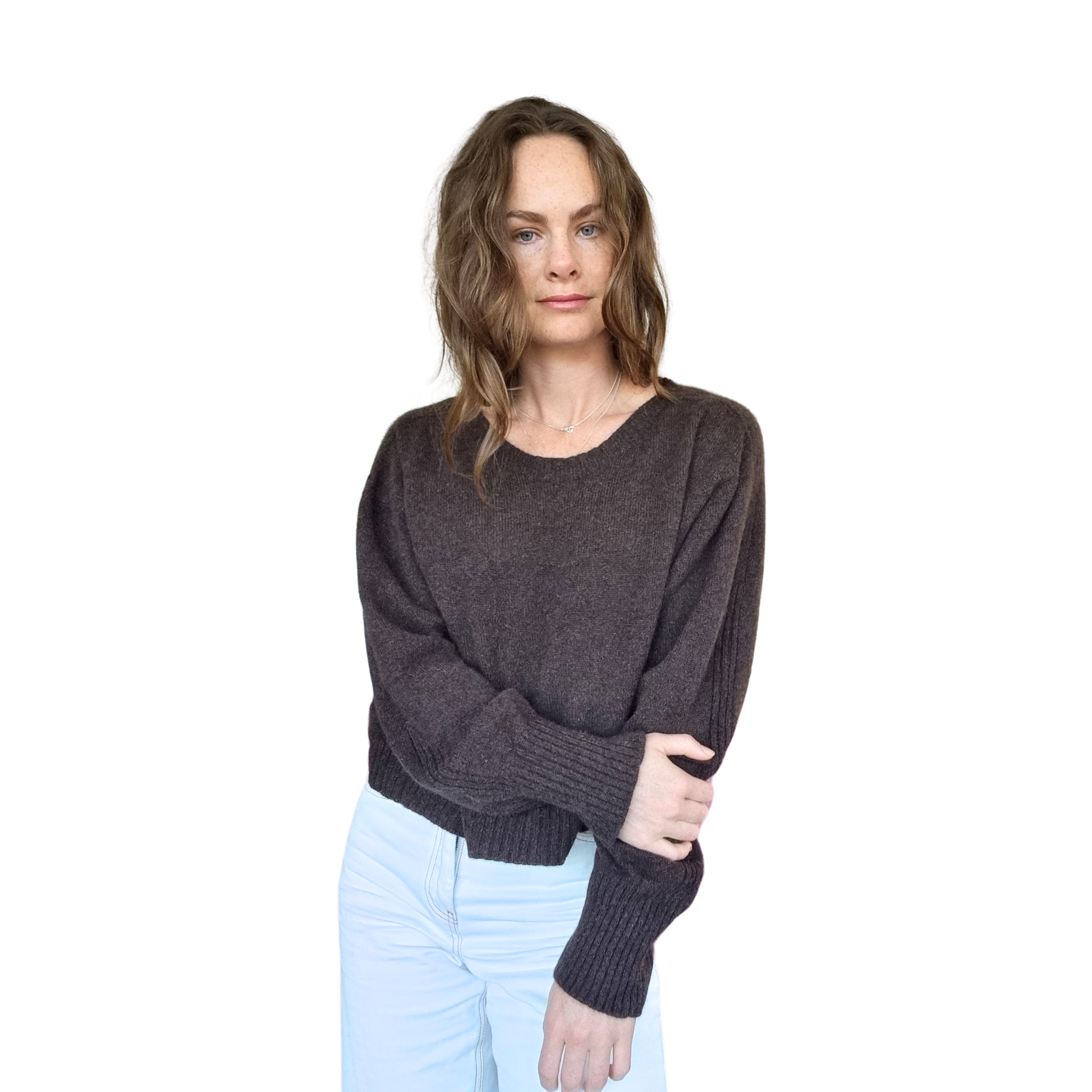 Crew neckline cropped boxy jumper woth rib detail along sleeve. Loose fit cuffs and hem sitting at waist section. Made in New Zealand from Merino Possum and Silk. Favourite Jumper currently trending
