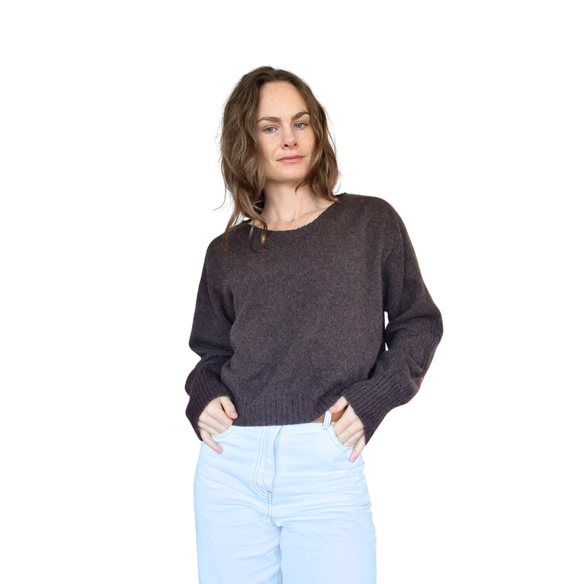 Crew neckline cropped boxy jumper woth rib detail along sleeve. Loose fit cuffs and hem sitting at waist section. Made in New Zealand from Merino Possum and Silk. Favourite Jumper currently trending