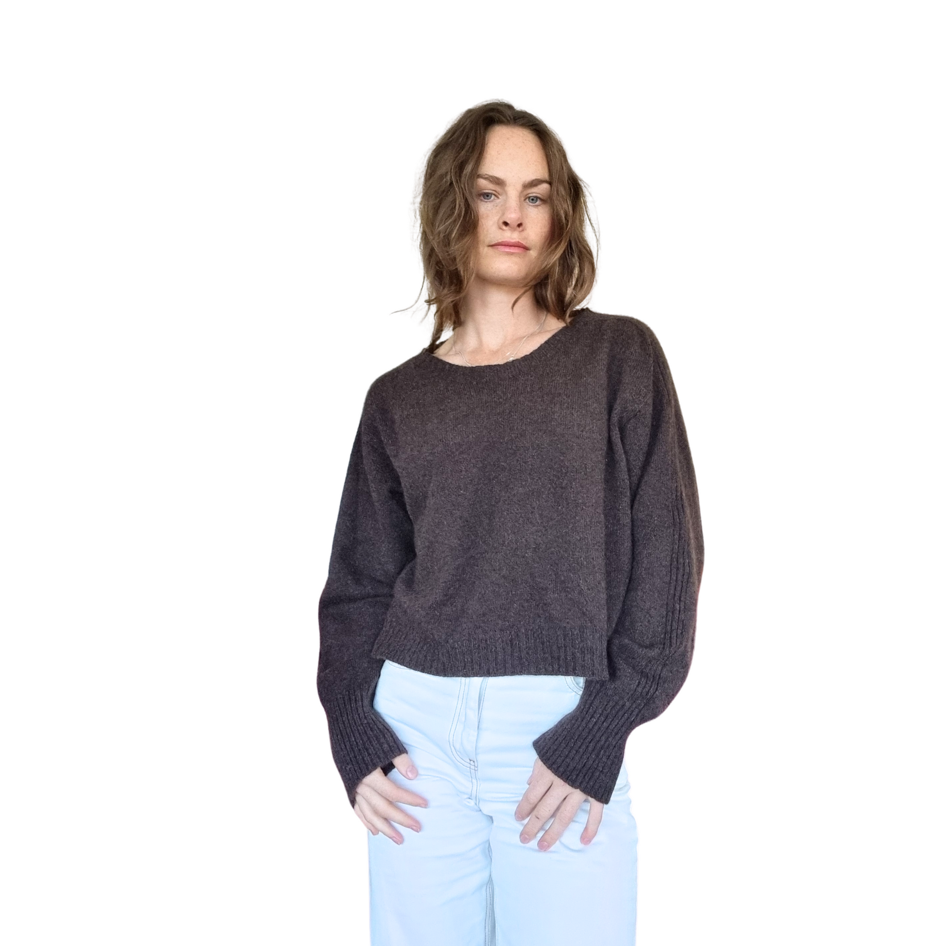 Crew neckline cropped boxy jumper woth rib detail along sleeve. Loose fit cuffs and hem sitting at waist section. Made in New Zealand from Merino Possum and Silk. Favourite Jumper currently trending