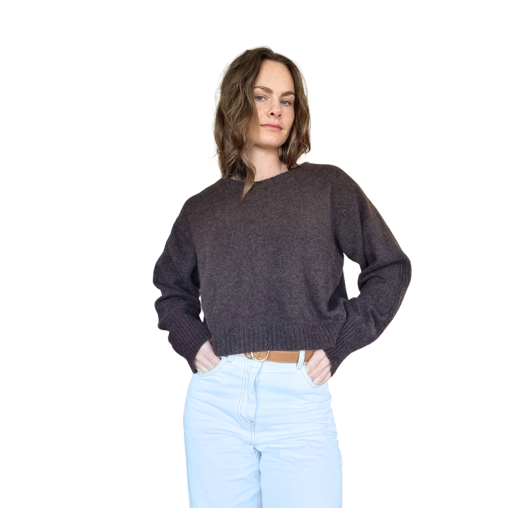 Crew neckline cropped boxy jumper woth rib detail along sleeve. Loose fit cuffs and hem sitting at waist section. Made in New Zealand from Merino Possum and Silk. Favourite Jumper currently trending