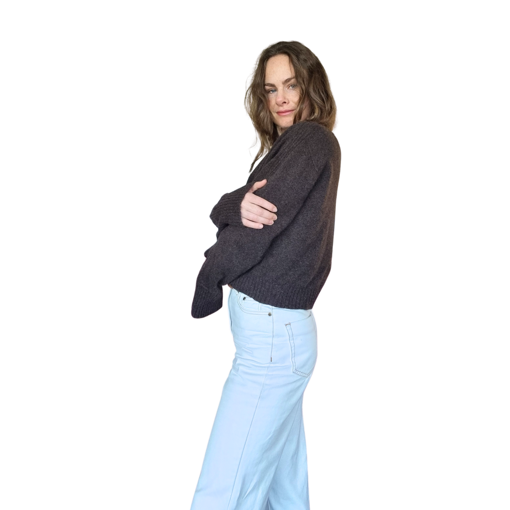 Crew neckline cropped boxy jumper woth rib detail along sleeve. Loose fit cuffs and hem sitting at waist section. Made in New Zealand from Merino Possum and Silk. Favourite Jumper currently trending