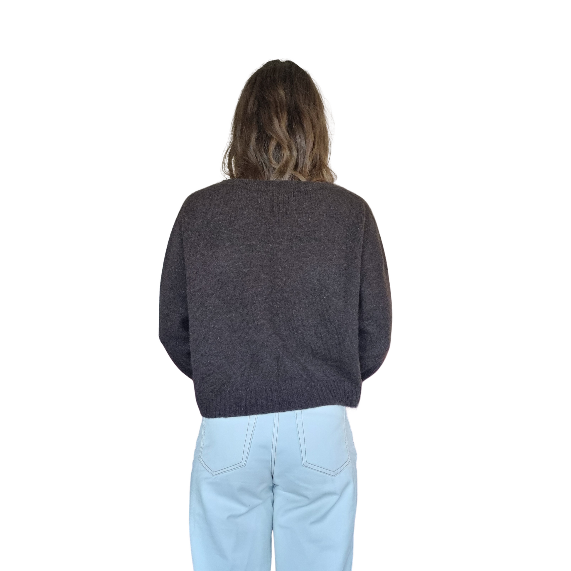 Crew neckline cropped boxy jumper woth rib detail along sleeve. Loose fit cuffs and hem sitting at waist section. Made in New Zealand from Merino Possum and Silk. Favourite Jumper currently trending