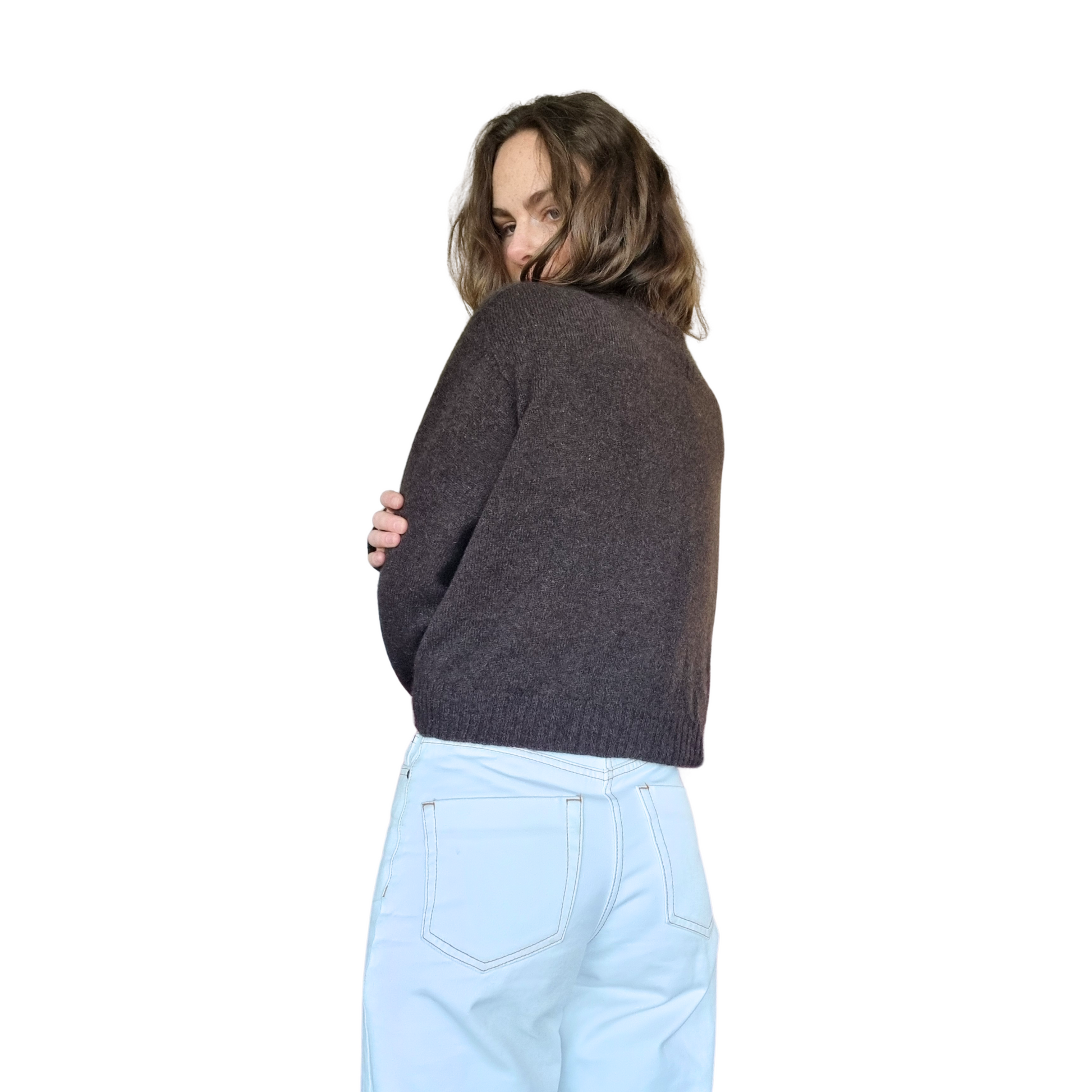 Crew neckline cropped boxy jumper woth rib detail along sleeve. Loose fit cuffs and hem sitting at waist section. Made in New Zealand from Merino Possum and Silk. Favourite Jumper currently trending