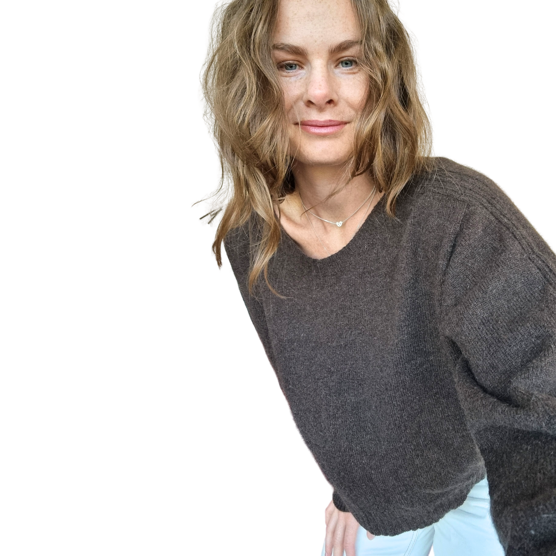 Crew neckline cropped boxy jumper woth rib detail along sleeve. Loose fit cuffs and hem sitting at waist section. Made in New Zealand from Merino Possum and Silk. Favourite Jumper currently trending