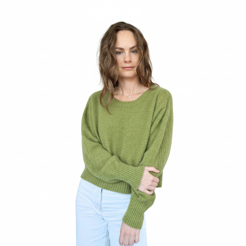 Crew neckline cropped boxy jumper woth rib detail along sleeve. Loose fit cuffs and hem sitting at waist section. Made in New Zealand from Merino Possum and Silk. Favourite Jumper currently trending