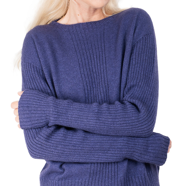detail view of ribbed hem cashmere possum silk knitted sweater in a purple , made in new zealand. Ribbed lined down the cetre front of the sweater and long ribbed sleeves