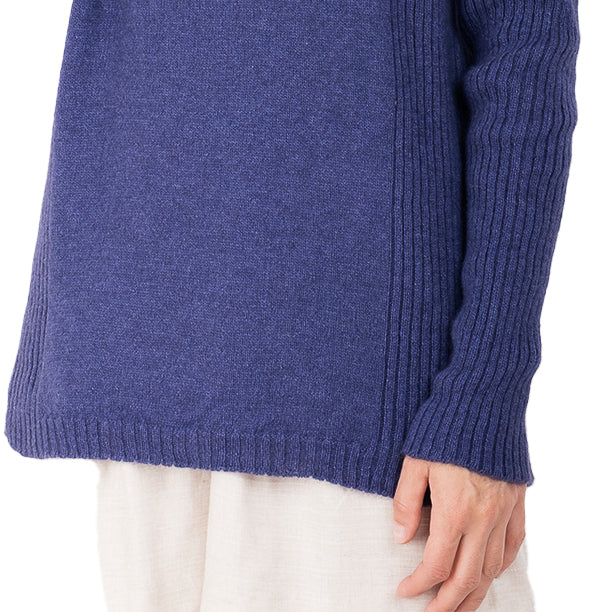 detail view of ribbed hem cashmere possum silk knitted sweater in purple, made in new zealand. Ribbed lined down the side of the sweater and long ribbed sleeves