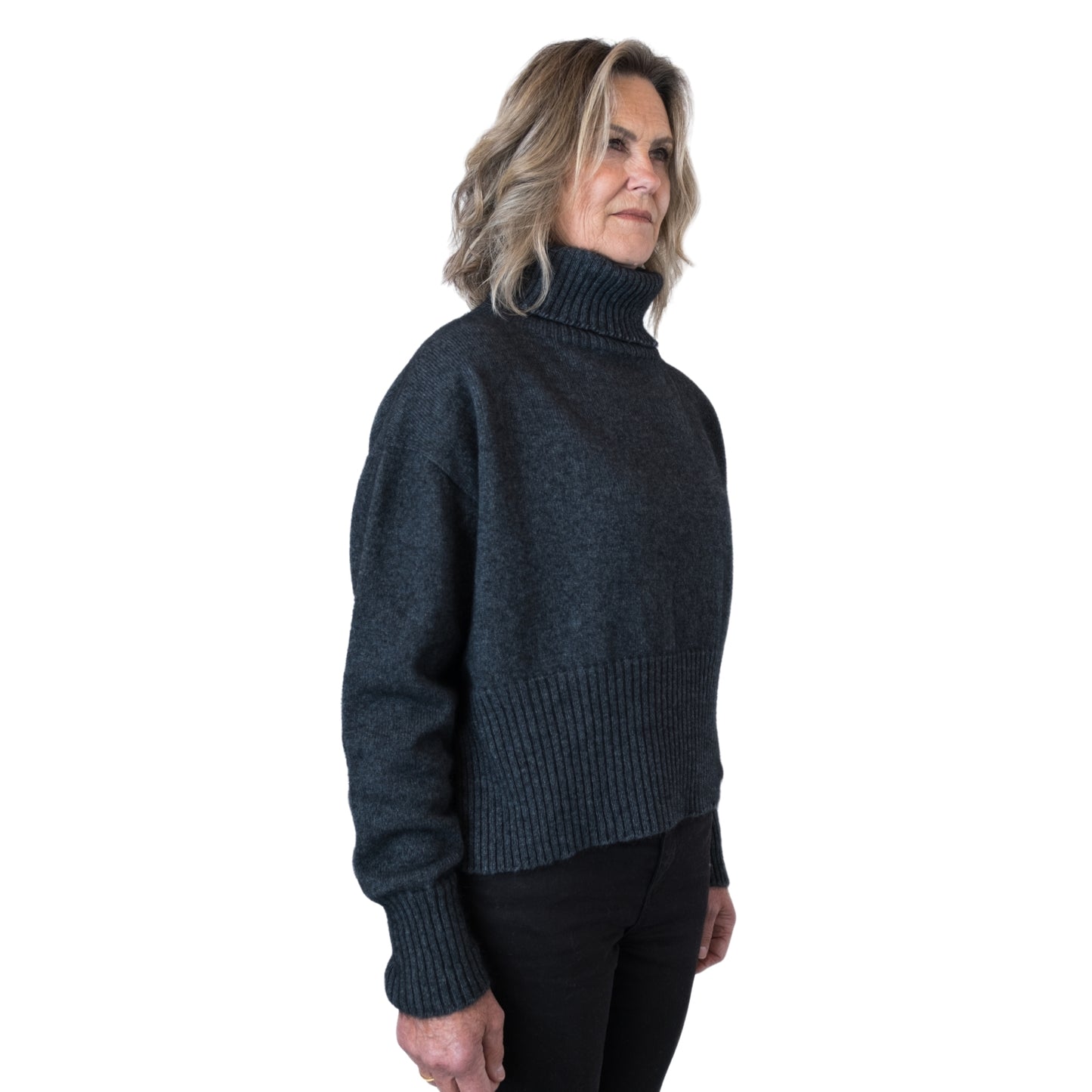 Split Hem Sweater in colour Charcoal. Loose turtleneck. Side
