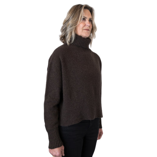 Split Hem Sweater in colour Kiwi. Loose turtleneck. Side