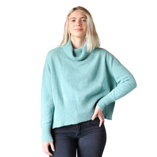 Split Hem Sweater in colour Seafoam. Loose turtleneck. Front