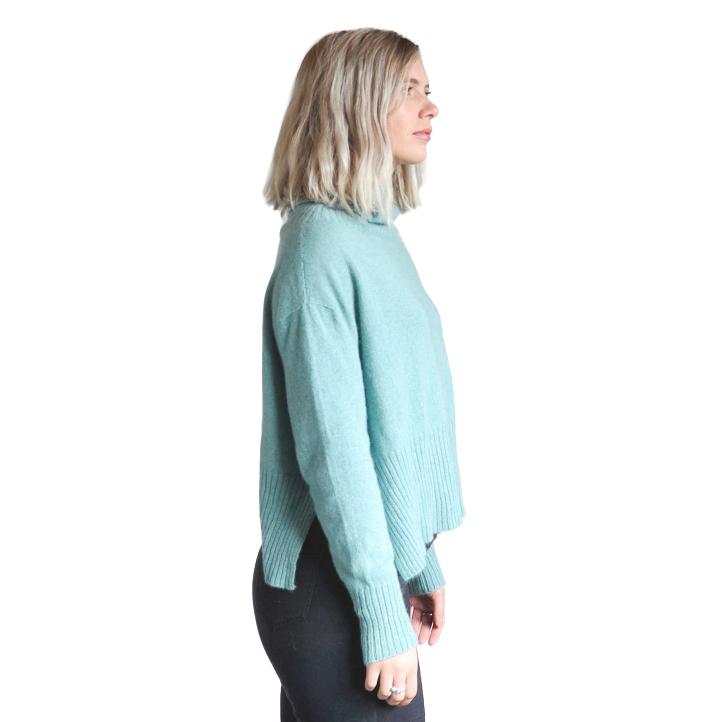 Split Hem Sweater in colour Seafoam. Loose turtleneck. Side