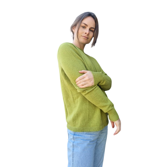 Pear green jumper on a woman