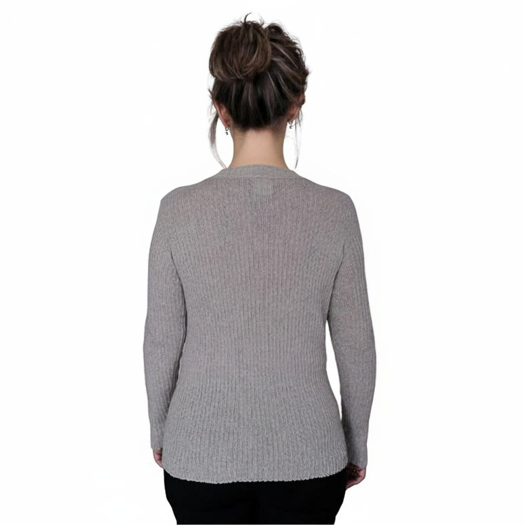 Person wearing a gray sweater on a white background