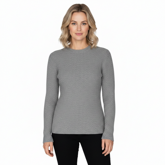 Woman wearing a gray ribbed sweater on a white background