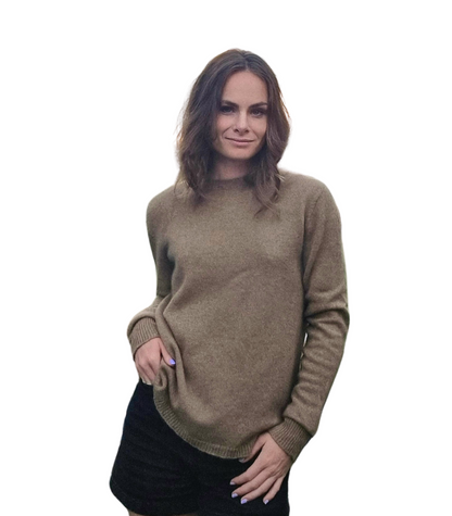 Everyday Jumper is made of caramel brown and made from Merino Possum Angora Silk. It features a crew neckline, rib hem, and cuff details. Everyday staple sweater