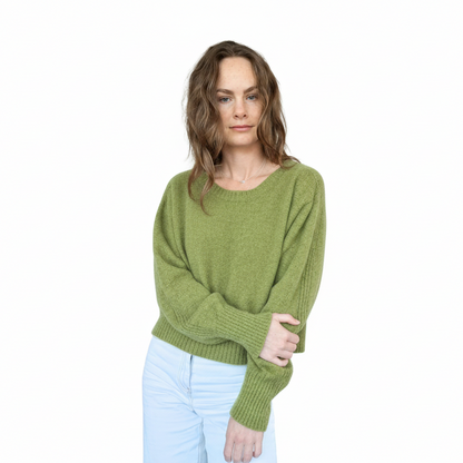 Crew neckline cropped boxy jumper woth rib detail along sleeve. Loose fit cuffs and hem sitting at waist section. Made in New Zealand from Merino Possum and Silk. Favourite Jumper currently trending