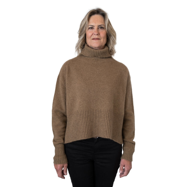 Split Hem Sweater in colour Caramel. Loose turtleneck. Front