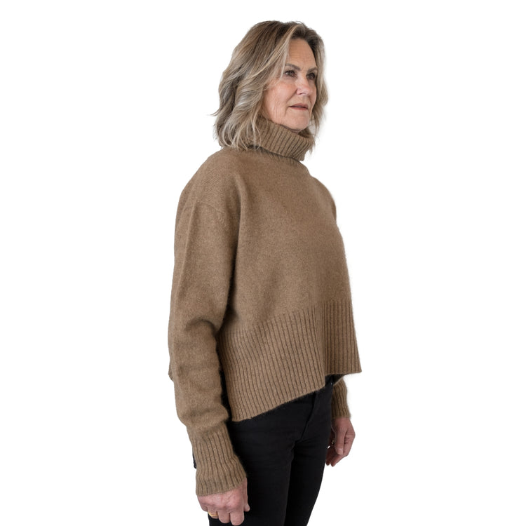 Split Hem Sweater in colour Caramel. Loose turtleneck. Side