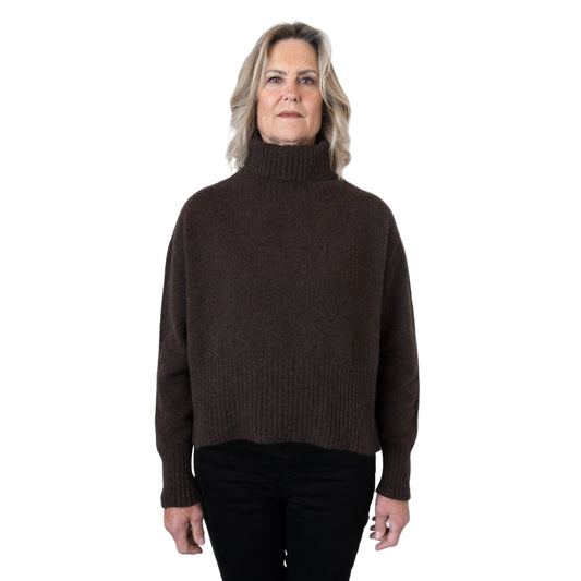 Split Hem Sweater in colour Kiwi. Loose turtleneck. Front